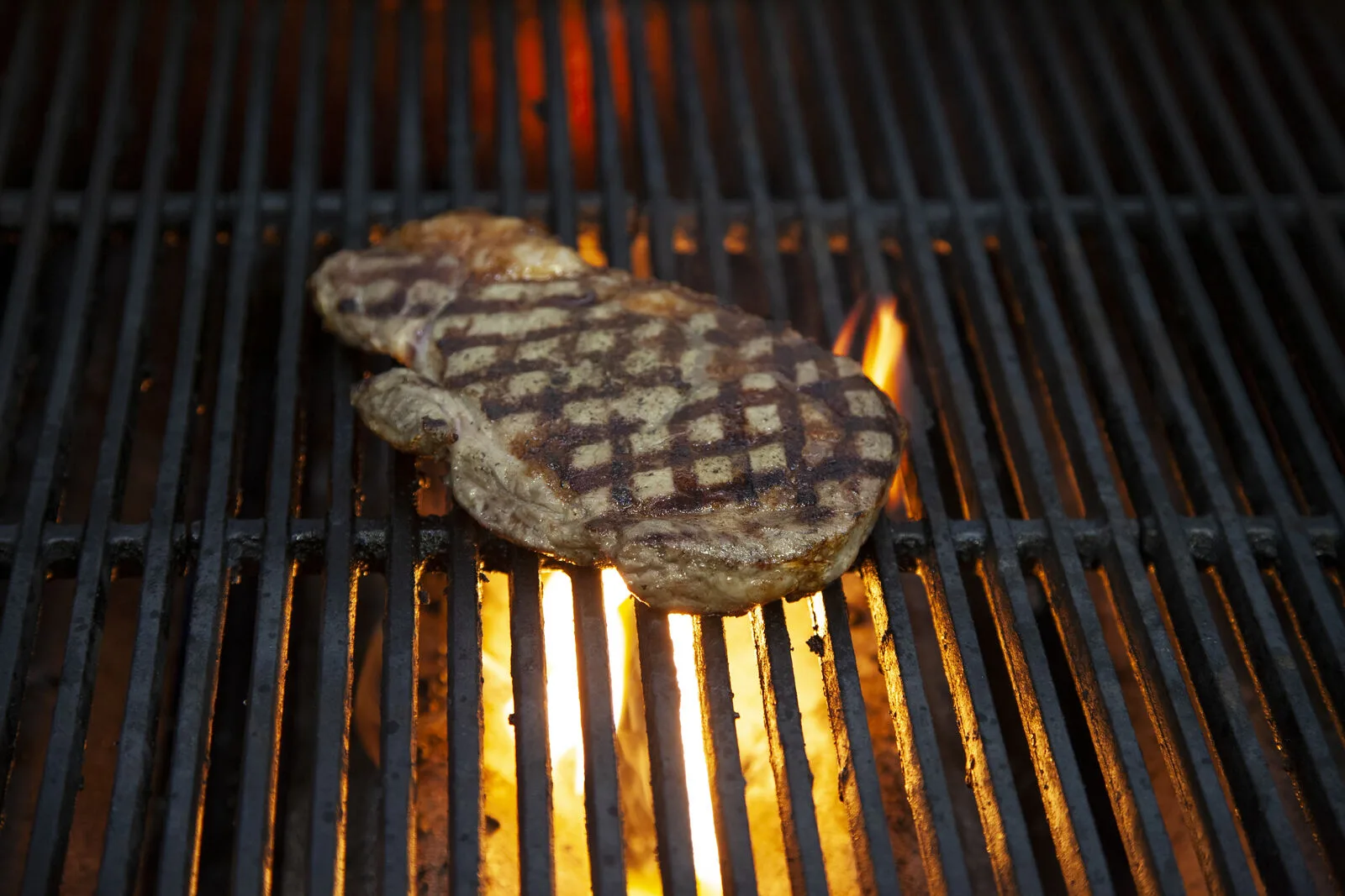 Dry-aged cut served at the lodge table