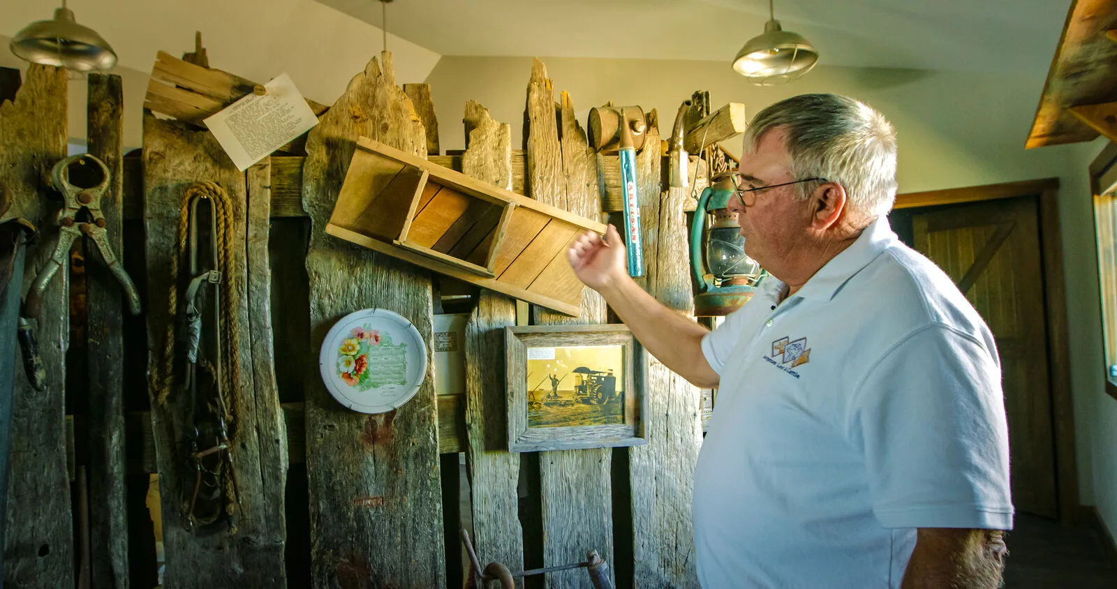 Inspecting antique tools in the heritage room