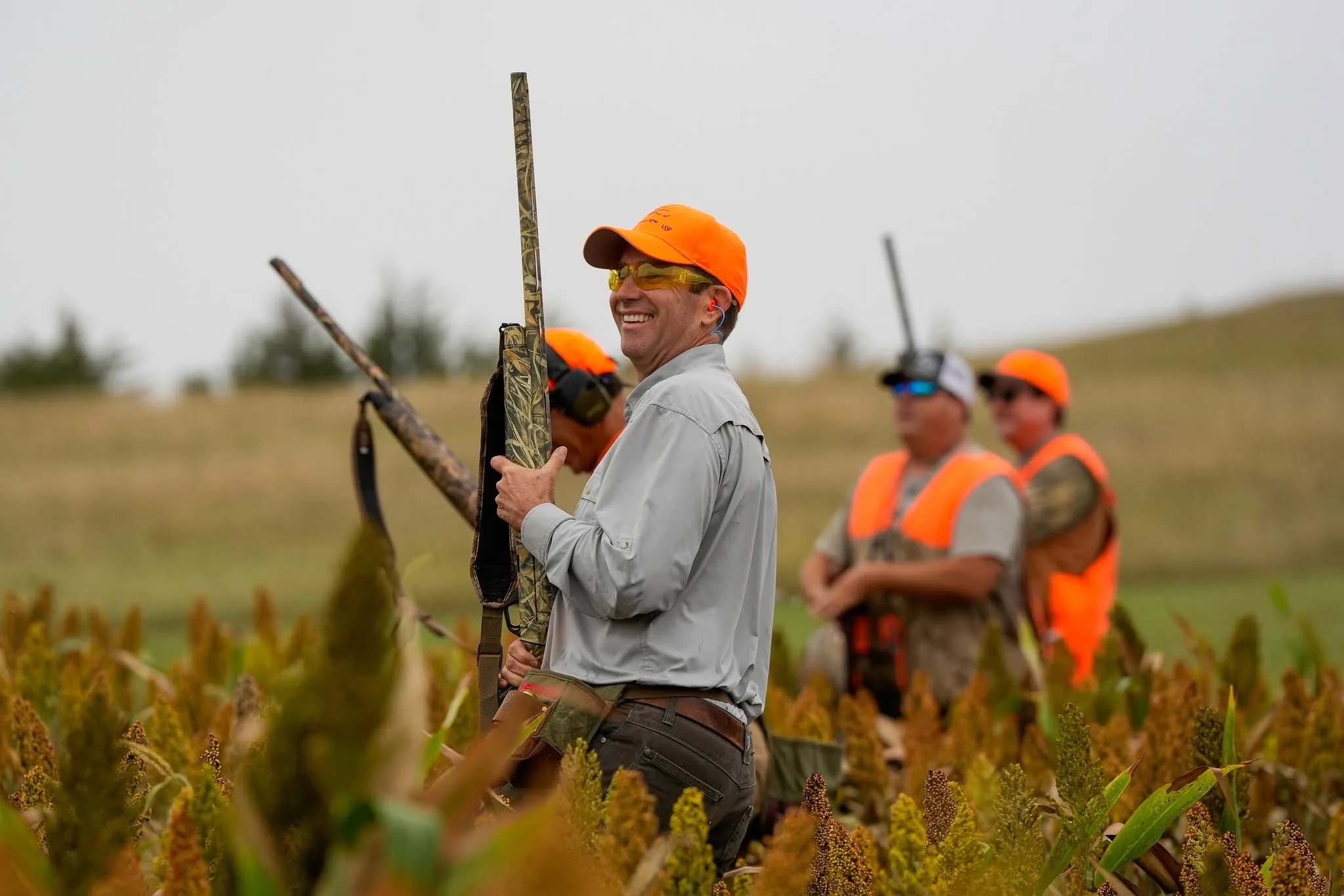 Wingshooters standing in a South Dakota dove field